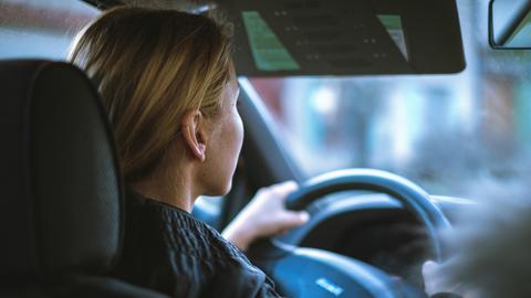Person driving a car