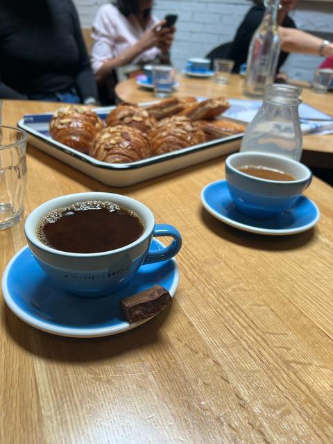 Cups of coffee and croissants